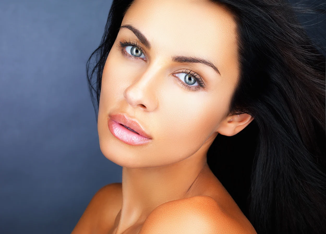 Woman with beautiful eyes and hair.
