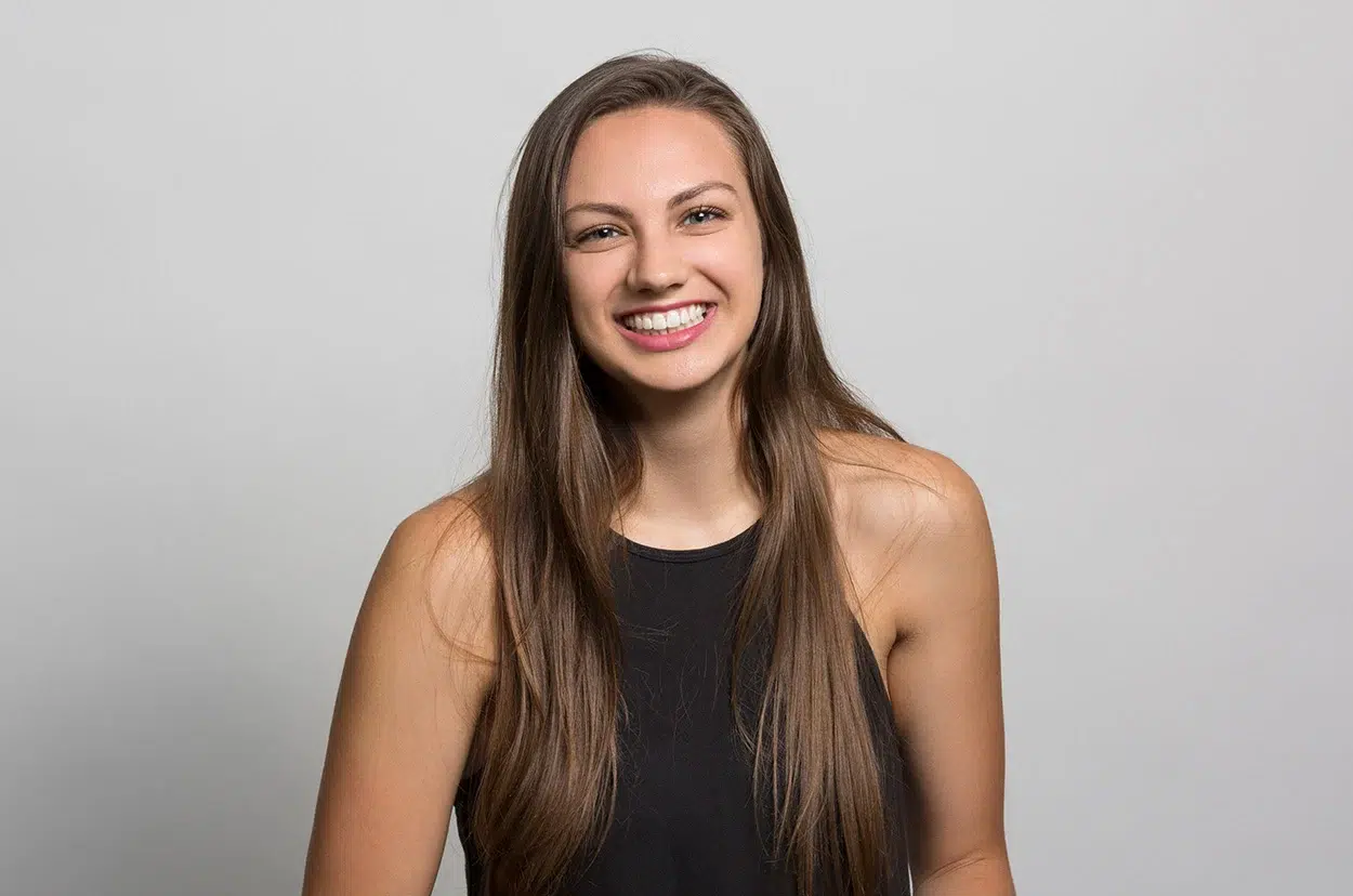 Happy young woman smiling. Happy young woman smiling.
